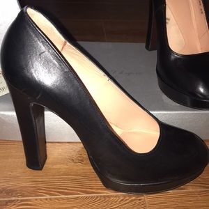 Black leather Robert Clergerie heels.